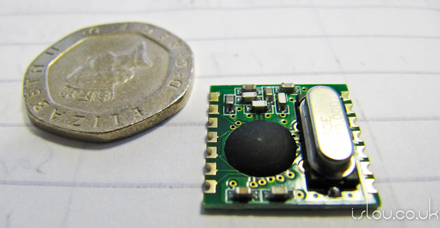 Picture of ALPHA RF Transceiver Module 433MHz SMT next to 20 pence